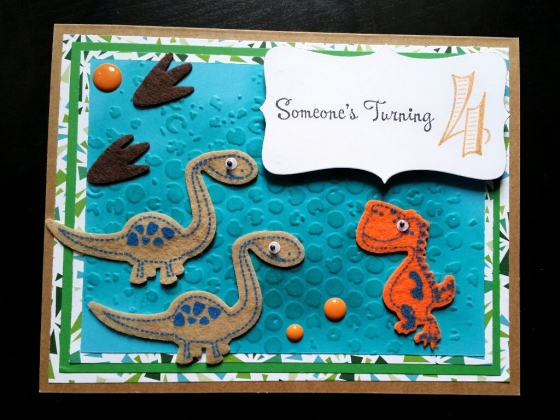A Bit Of Glue & Paper - dinosaur card for 4th birthday with felt dinosaurs, paper embossed and inked to look like dinosaur skin - Vancouver BC