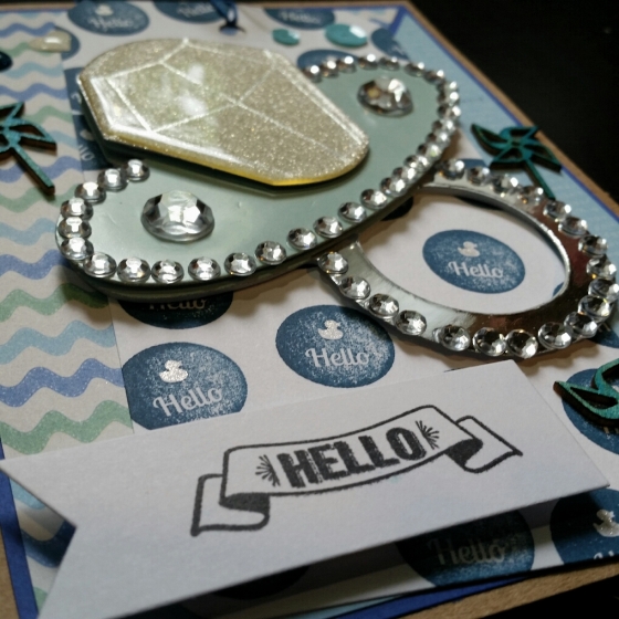 A Bit Of Glue & Paper - handmade greeting card for new baby boy with bling soother, wooden pinwheels, stamped tag, detail - Vancouver BC
